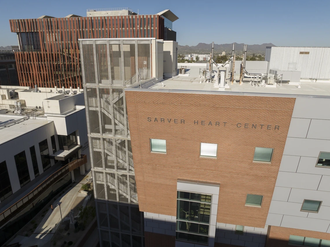 A red brick building that says "Sarver Heart Center"