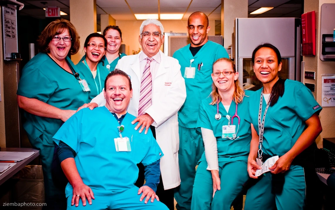 A group of medical professionals standing and smiling