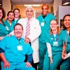 A group of medical professionals standing and smiling