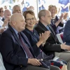 Audience members applaud during a University of Arizona ceremony celebrating the Wyant College renaming.
